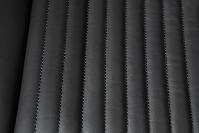 Photo of Car seat with leather upholstery, closeup view