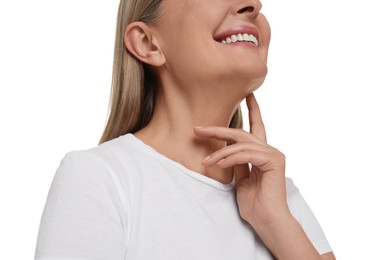 Photo of Mature woman touching her neck on white background, low angle view