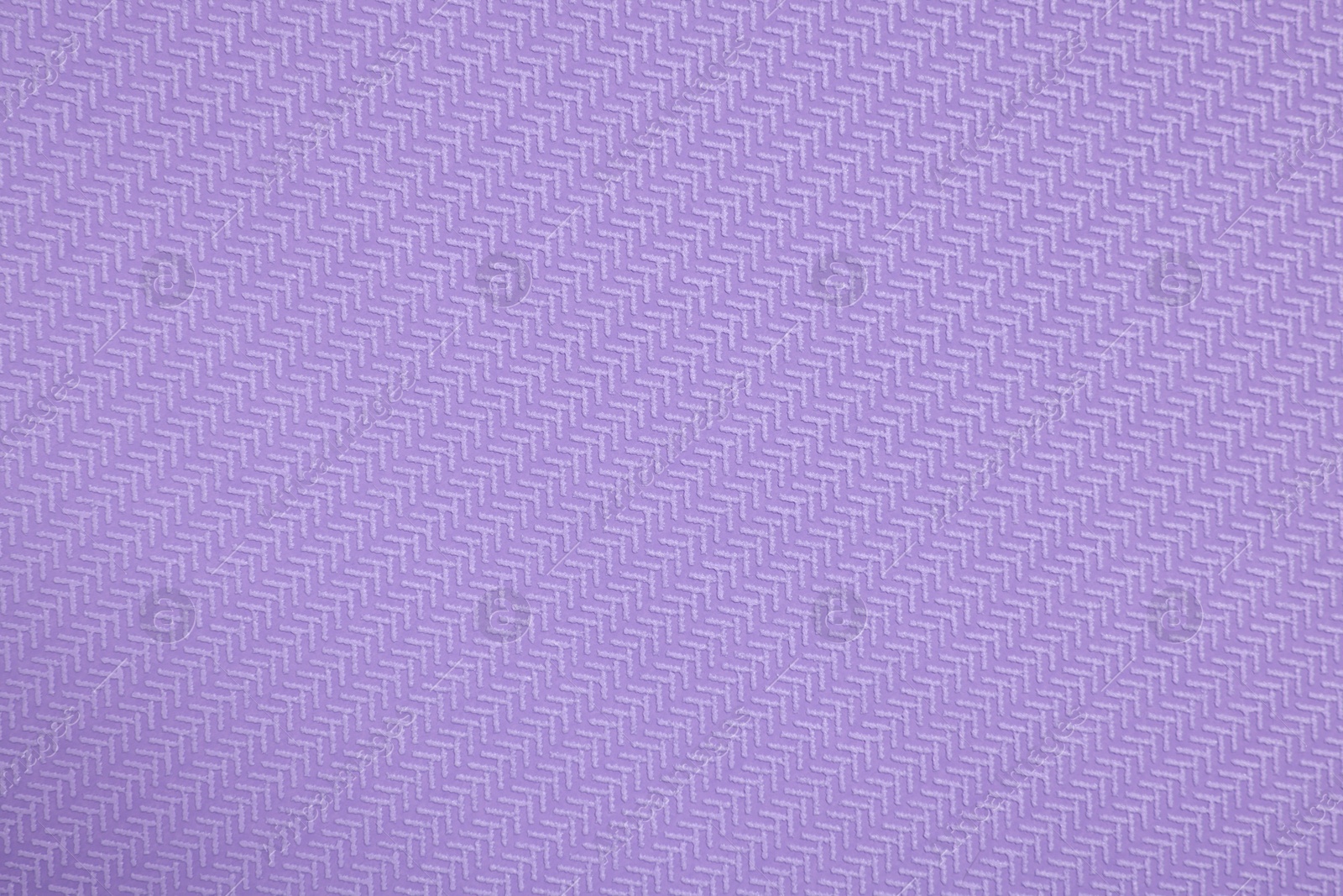 Photo of Stylish violet wallpaper as background, closeup view