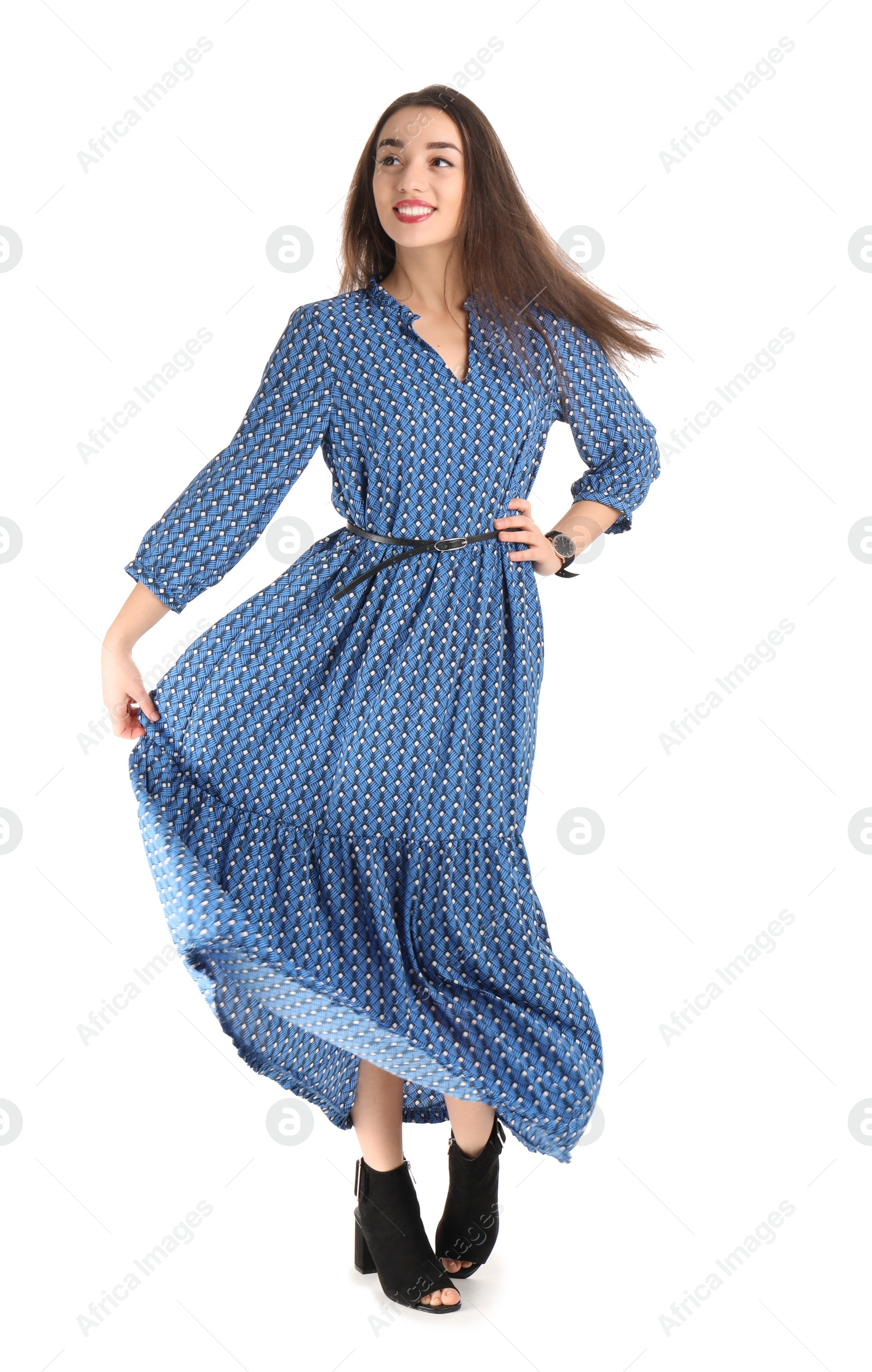 Photo of Portrait of beautiful young woman in stylish dress on white background