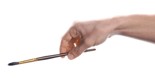 Man holding paint brush on white background, closeup