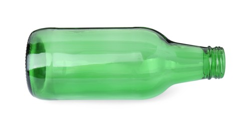 Photo of One empty green beer bottle isolated on white