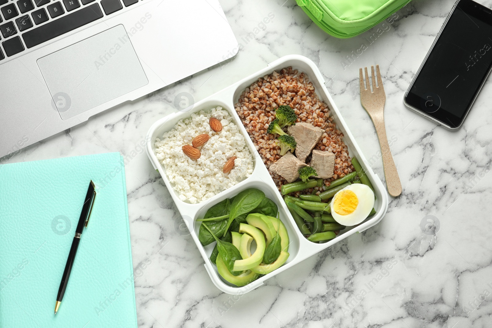 Photo of Flat lay composition with container of natural protein food on office table