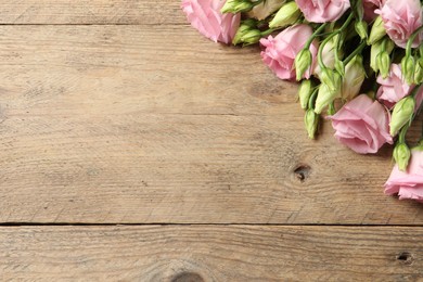 Happy Mother's Day. Beautiful flowers on wooden table, space for text