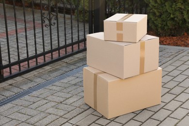 Stack of parcels delivered near front gates