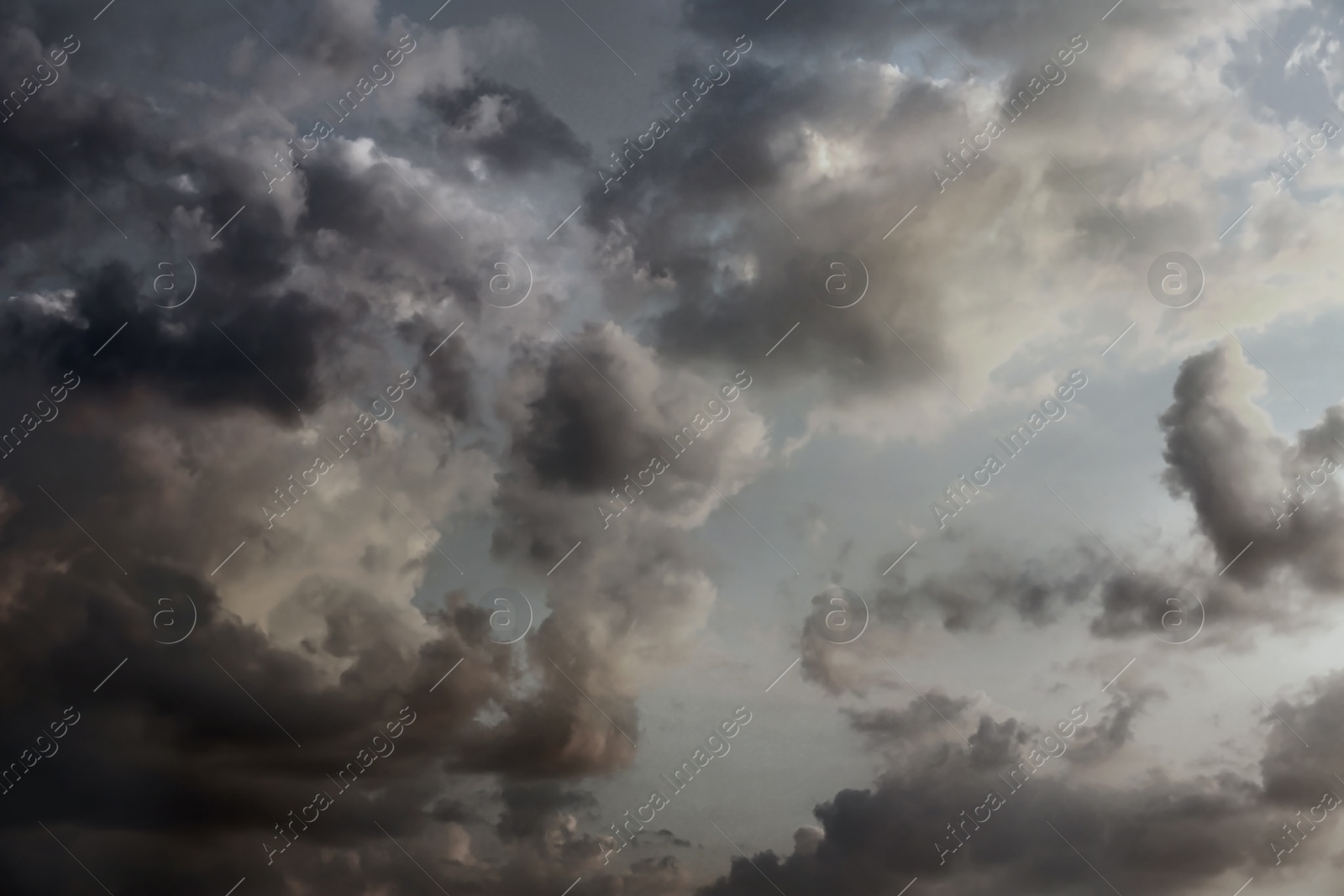 Image of Sky covered with rainy clouds. Stormy weather