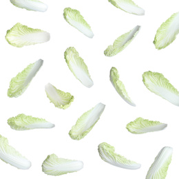 Set with falling fresh leaves of napa cabbage on white background