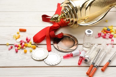 Photo of Composition with drugs on white wooden table. Doping control