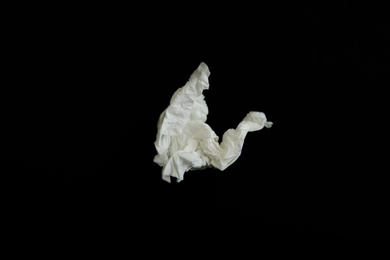 Photo of Used paper tissue on black background, top view