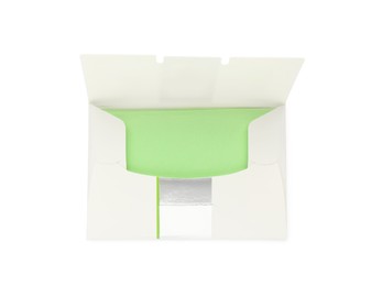 Photo of Package of facial oil blotting tissues isolated on white, top view. Mattifying wipes