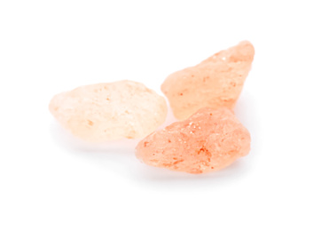 Photo of Crystals of pink himalayan salt isolated on white