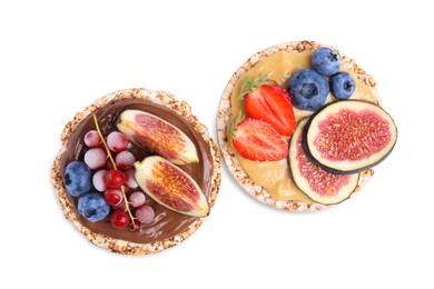 Photo of Tasty crispbreads with different toppings on white background