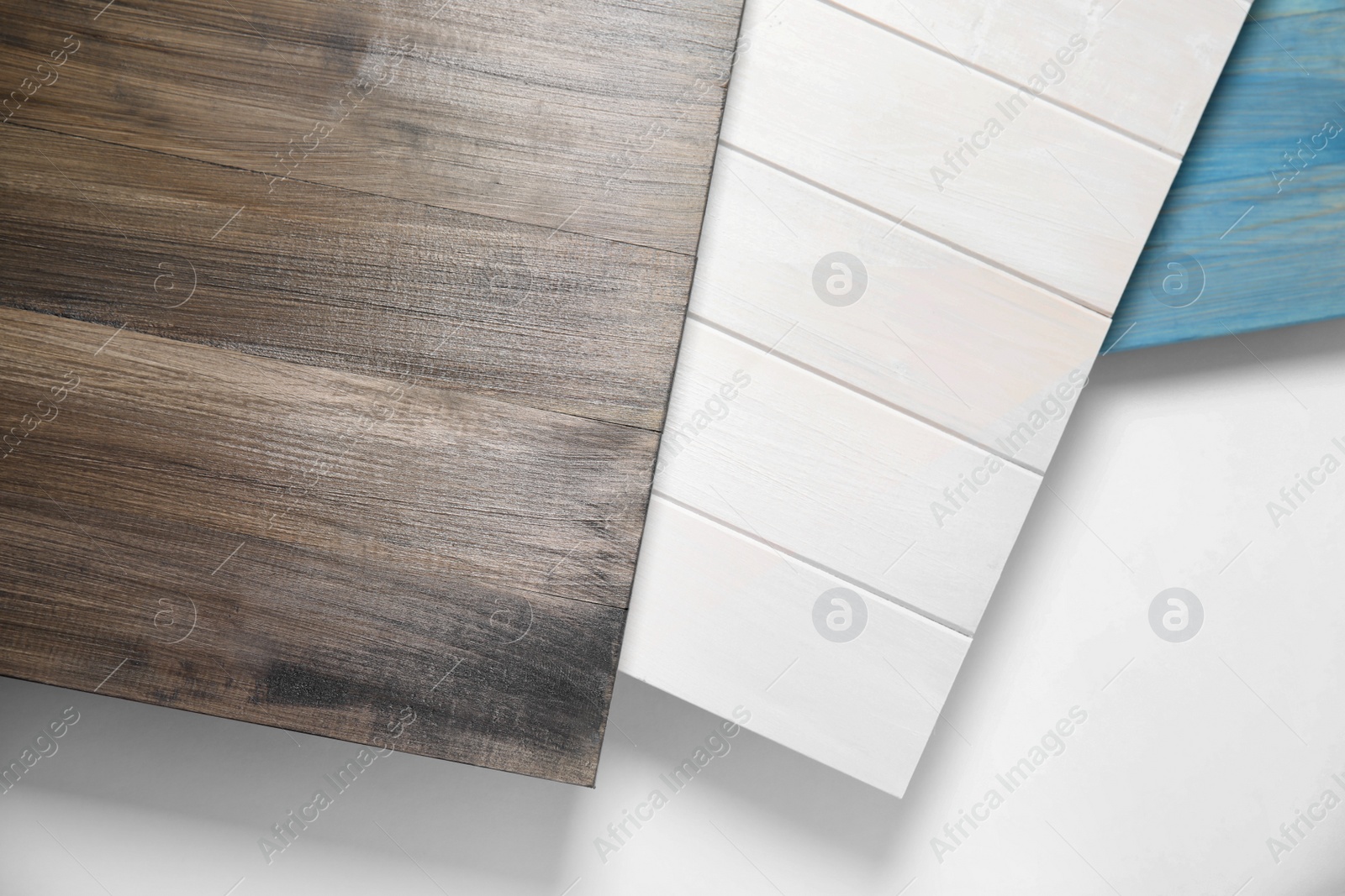 Photo of Different wooden surfaces for photography on white background, top view