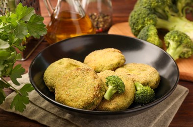 Photo of Tasty vegan cutlets with broccoli on table, closeup