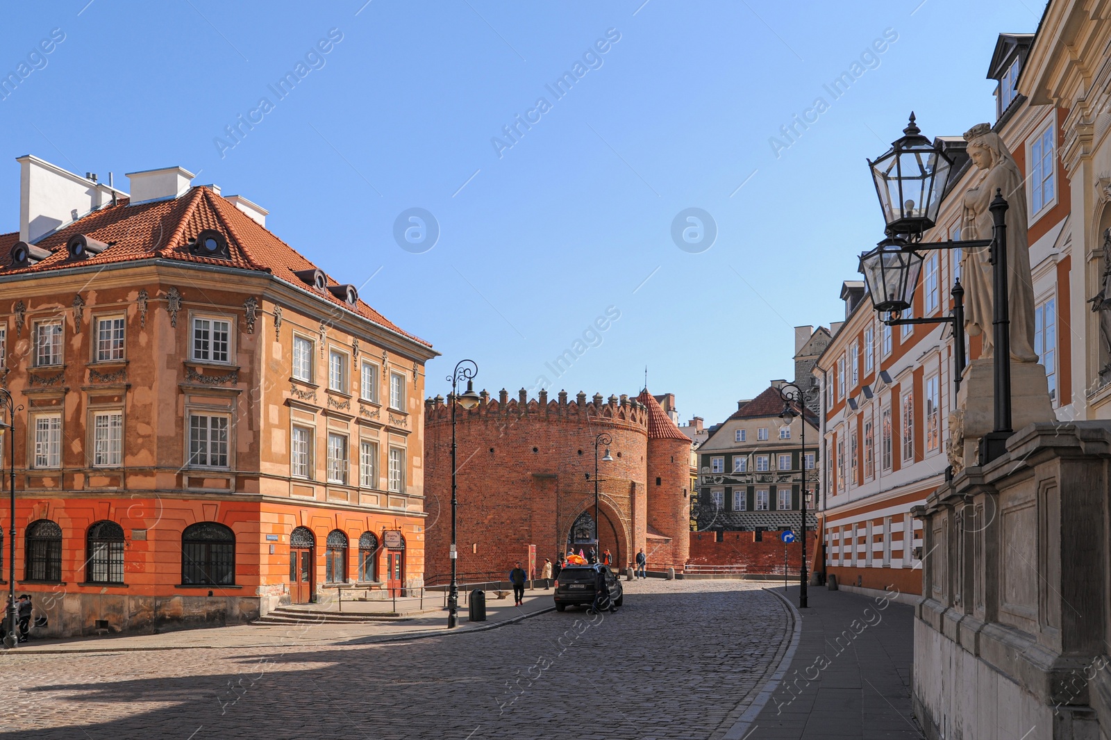 Photo of WARSAW, POLAND - MARCH 22, 2022: Beautiful view of Old Town Square on sunny day