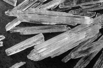 Photo of Menthol crystals on grey background, closeup view