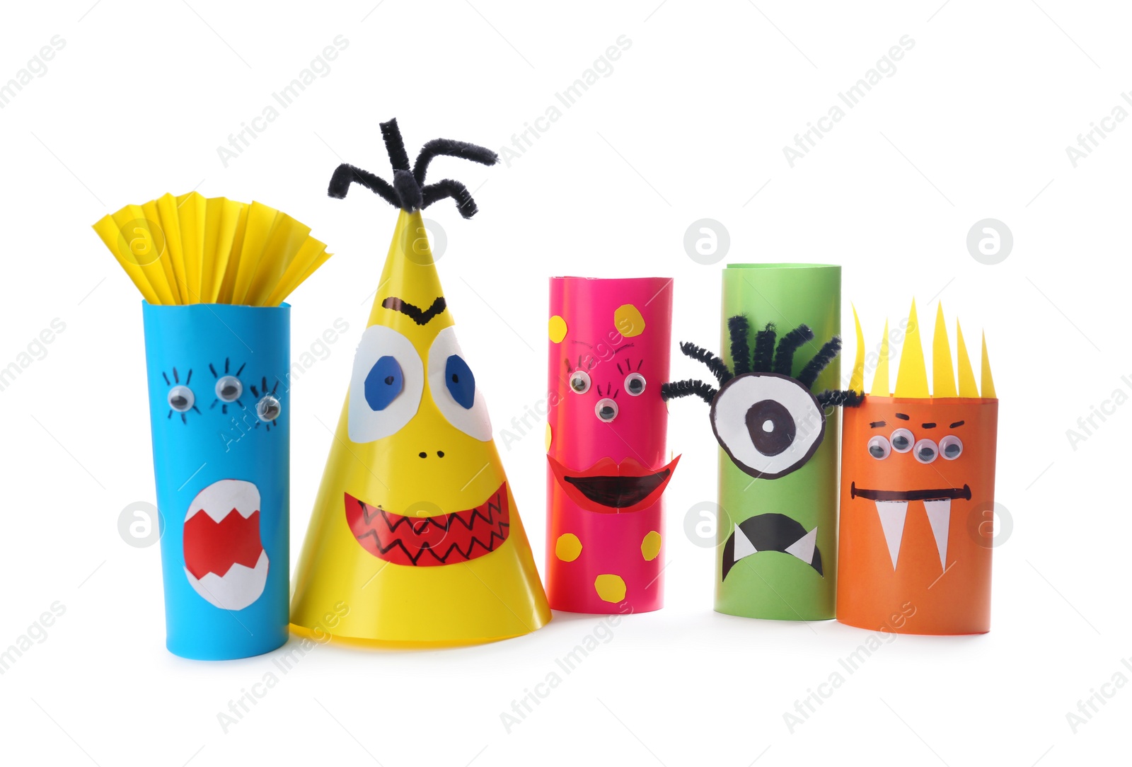 Photo of Funny monsters on white background. Halloween decoration