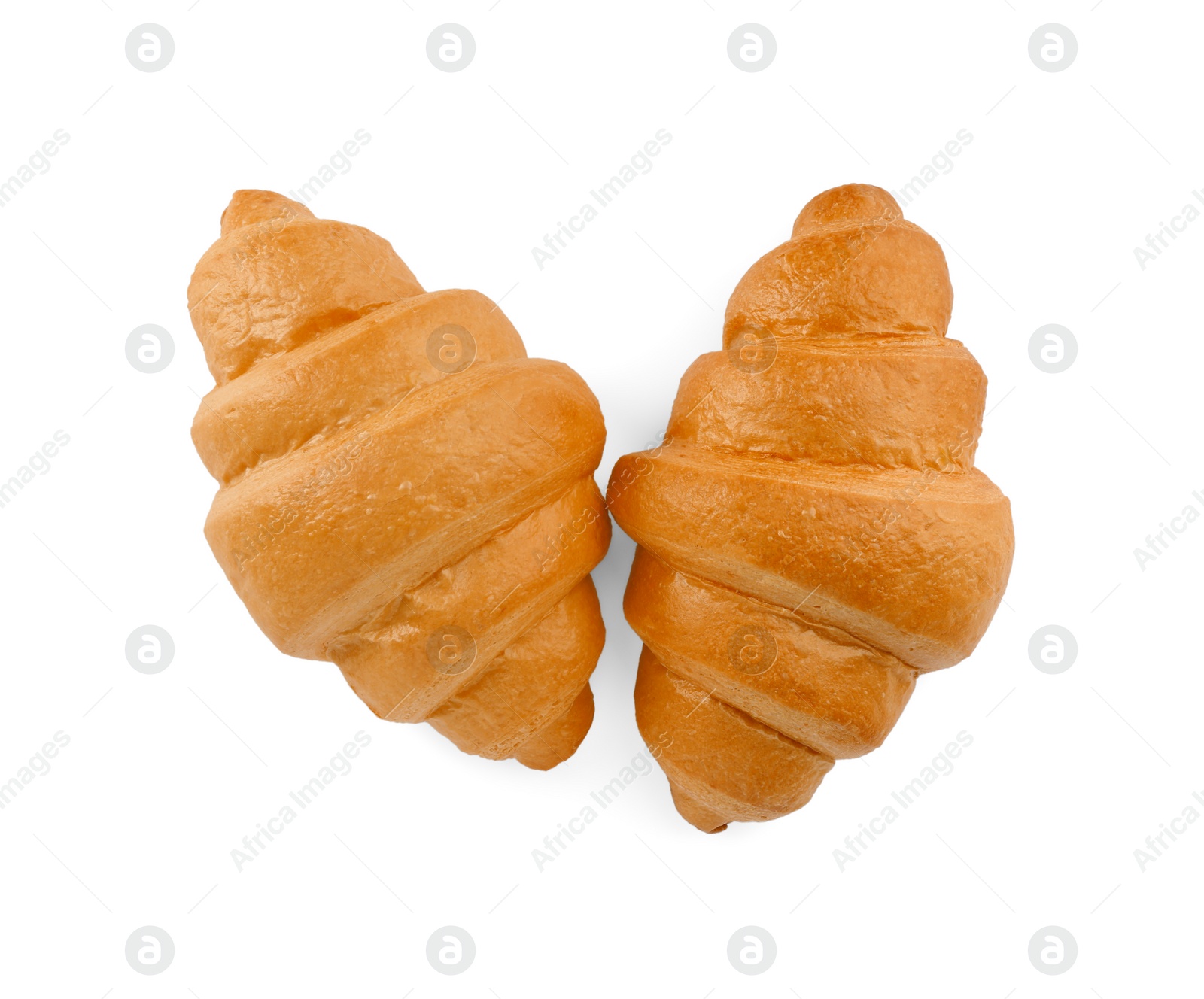 Photo of Delicious fresh croissants isolated on white, top view