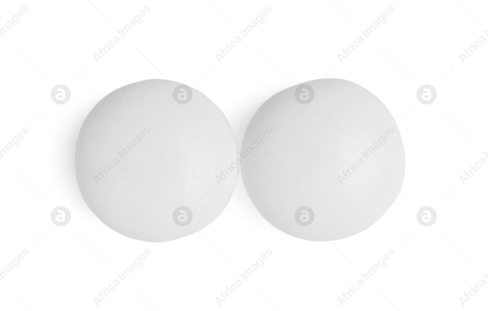 Photo of Two tasty bubble gums isolated on white, top view