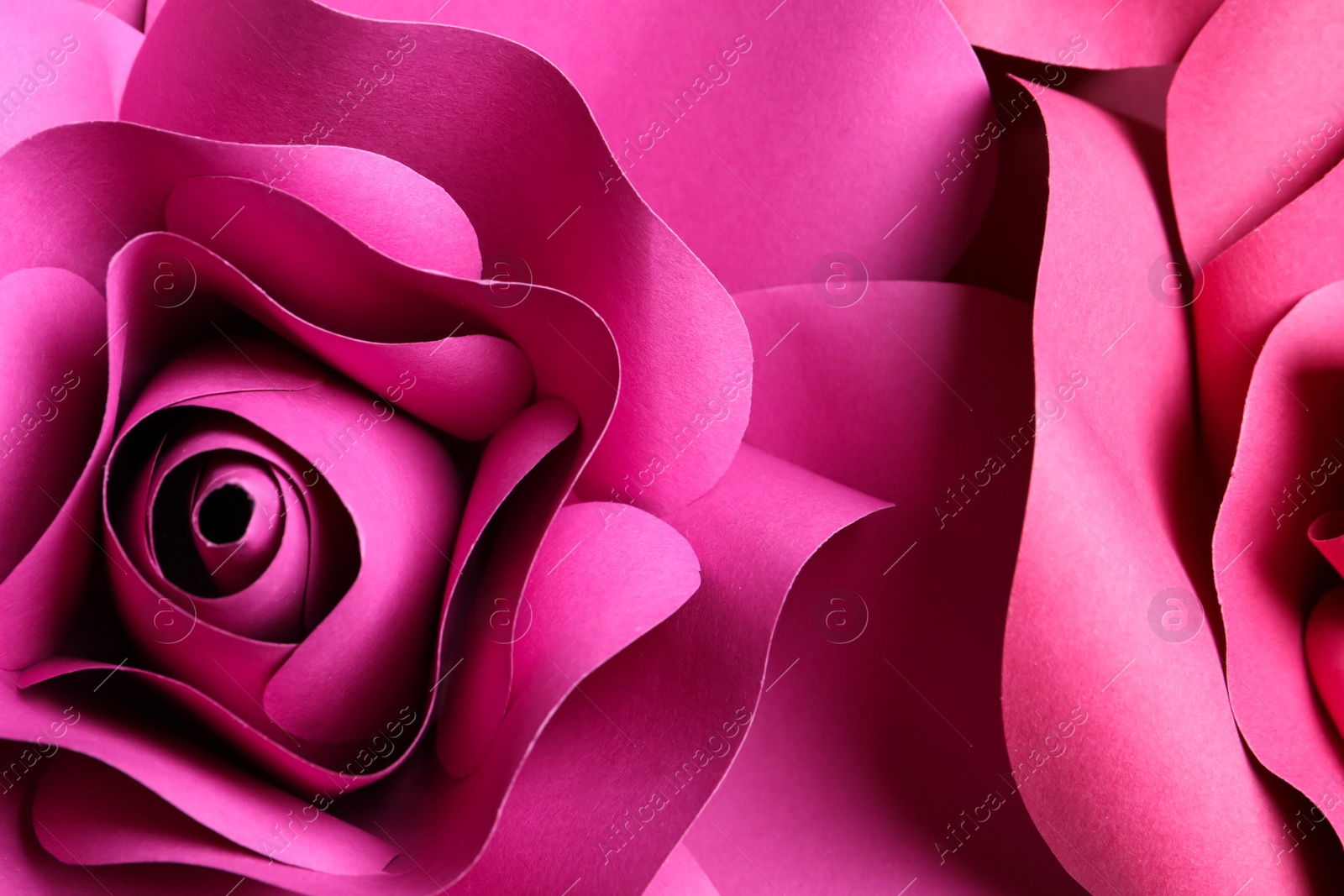 Photo of Beautiful flowers made of paper as background, top view