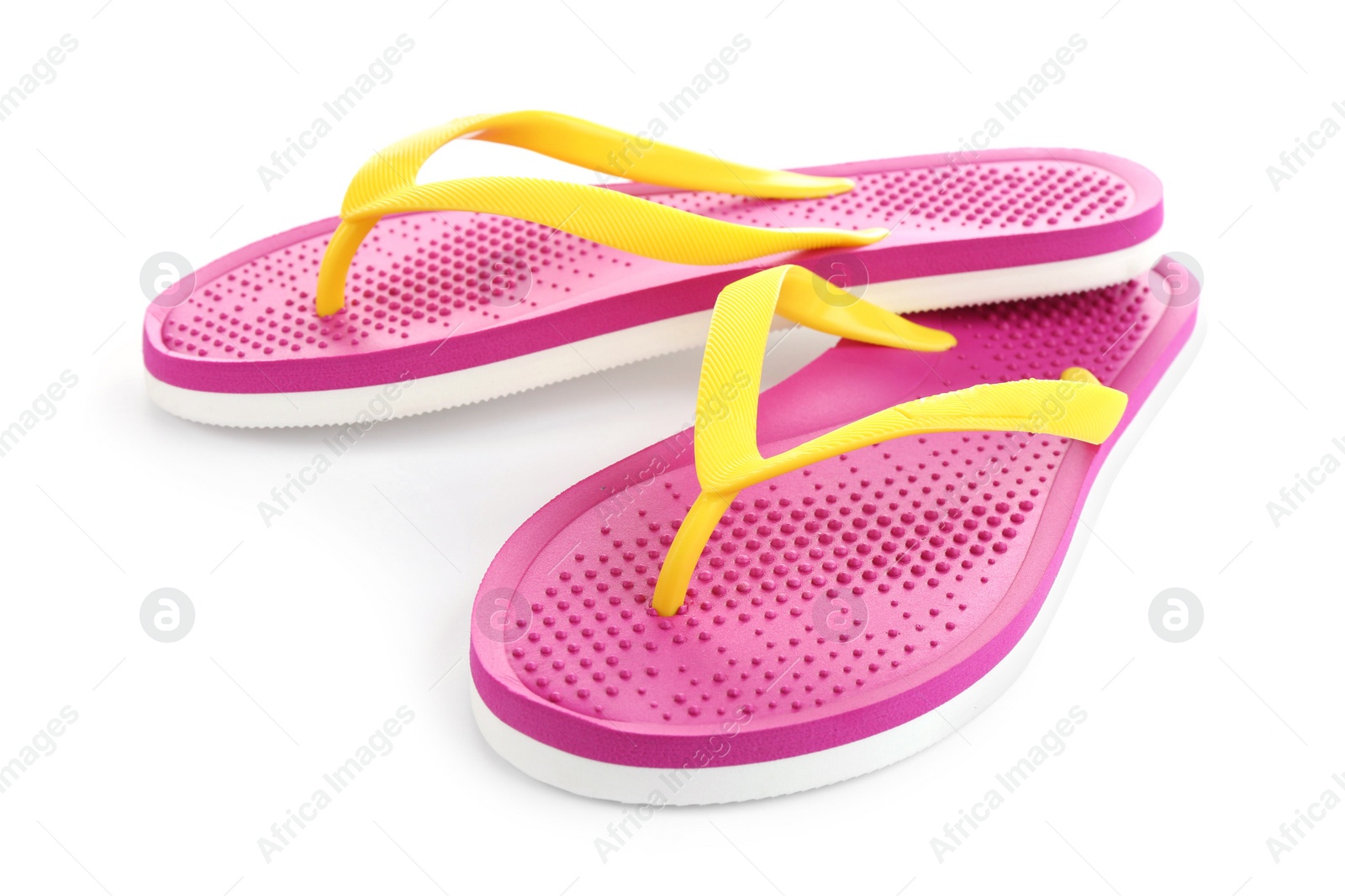 Photo of Stylish pink flip flops isolated on white