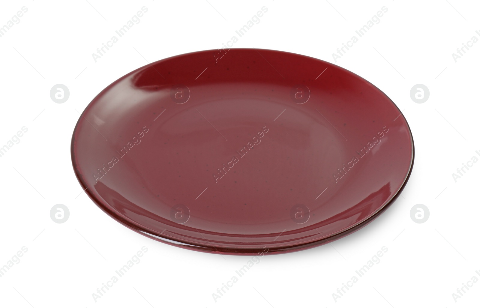 Photo of One beautiful burgundy plate isolated on white