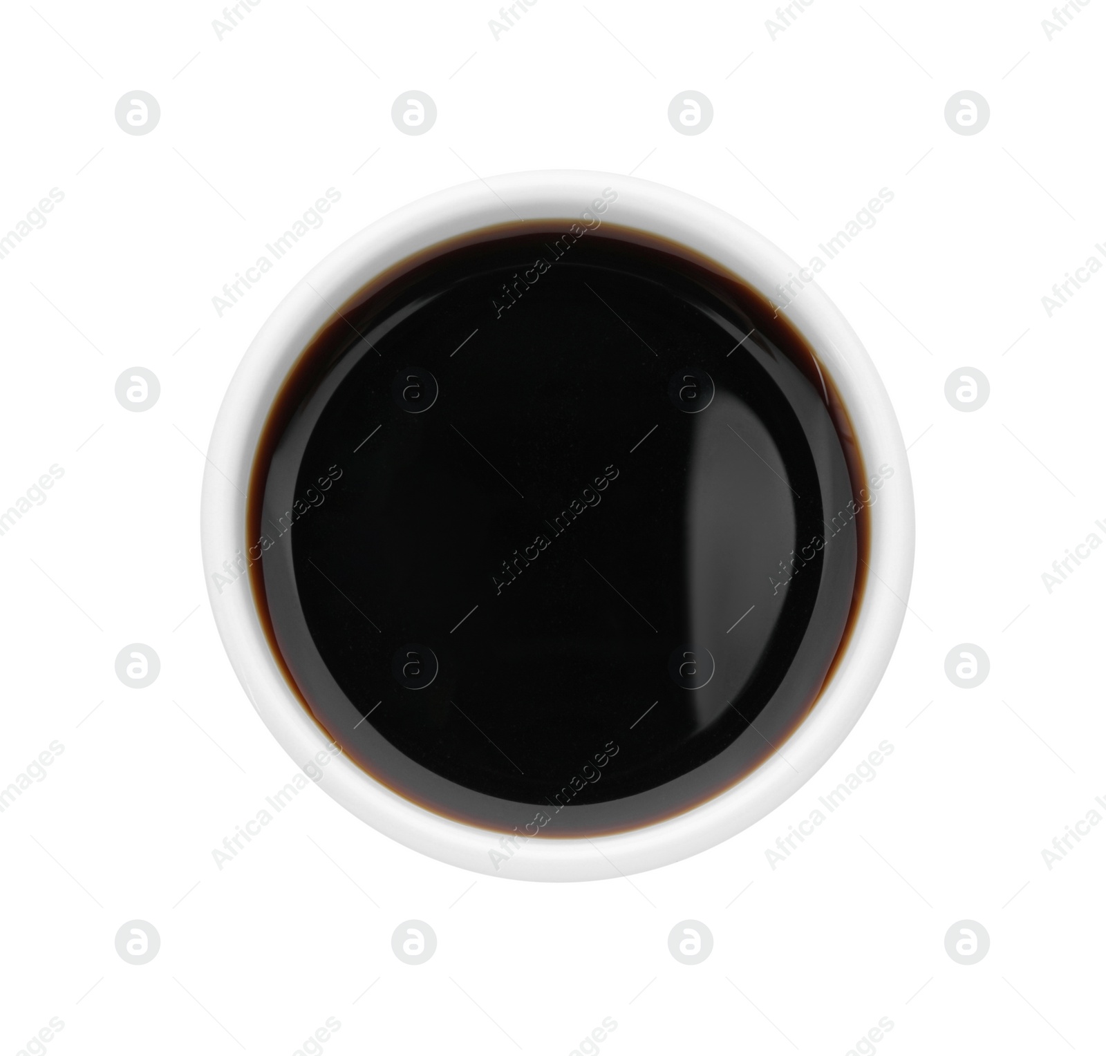 Photo of Tasty soy sauce in bowl isolated on white, top view