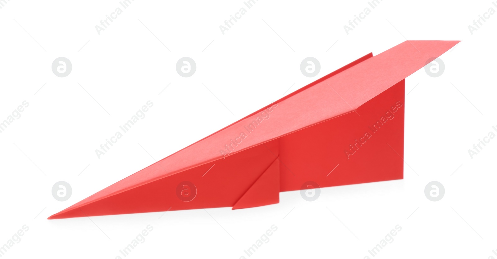 Photo of Handmade red paper plane isolated on white