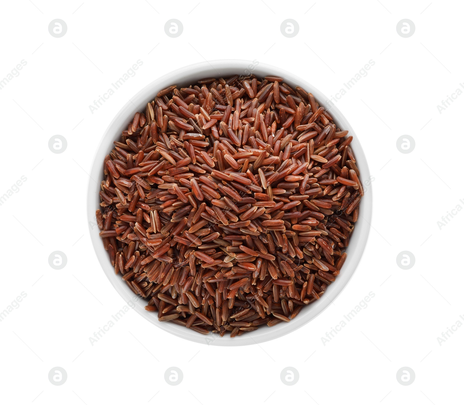 Photo of Ceramic bowl with brown rice on white background, top view