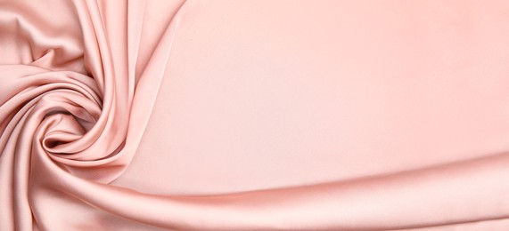 Image of Pink silk fabric as background, top view with space for text. Banner design