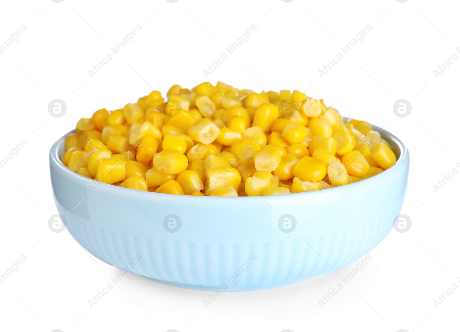 Photo of Delicious canned corn in bowl isolated on white