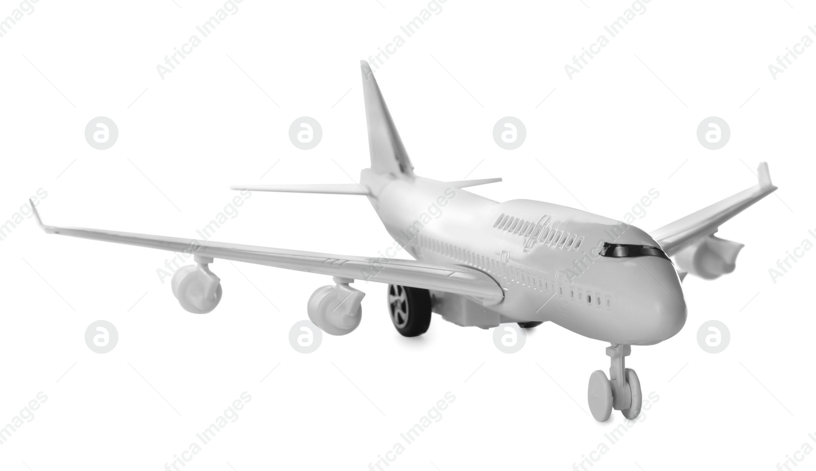 Photo of Toy airplane isolated on white. Travel concept