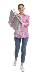 Young woman holding metal ladder on white background