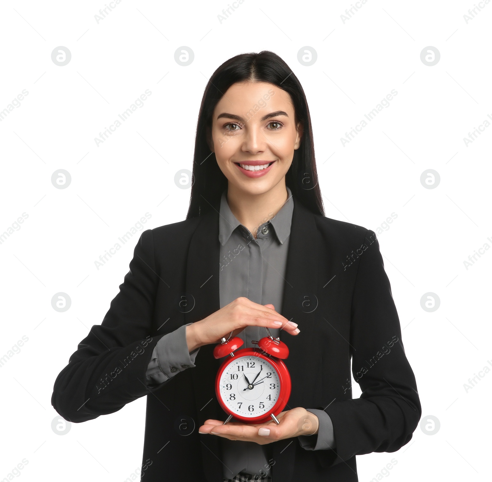 Photo of Businesswoman holding alarm clock on white background. Time management