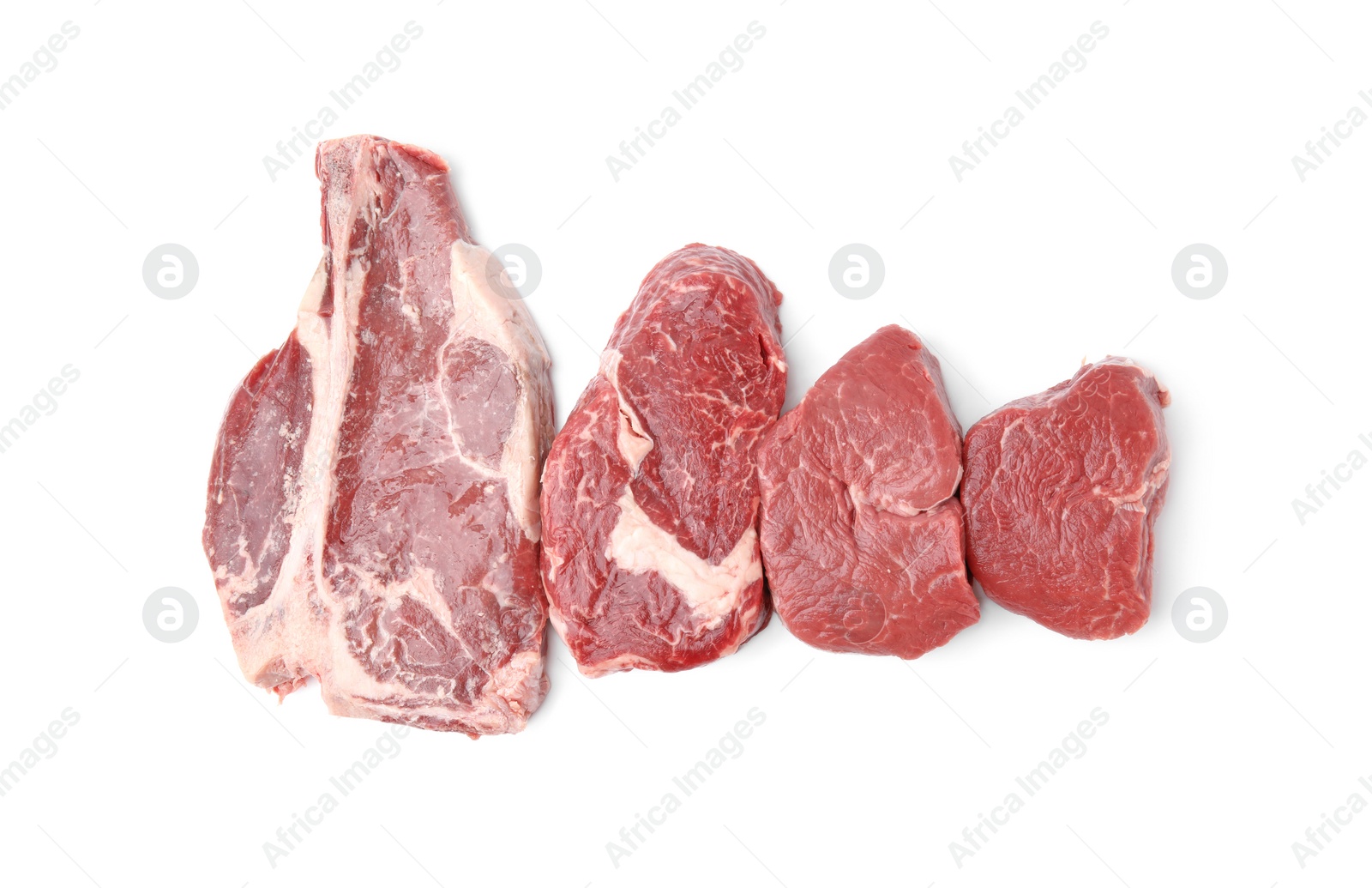 Photo of Cut fresh beef meat isolated on white, top view