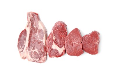 Photo of Cut fresh beef meat isolated on white, top view