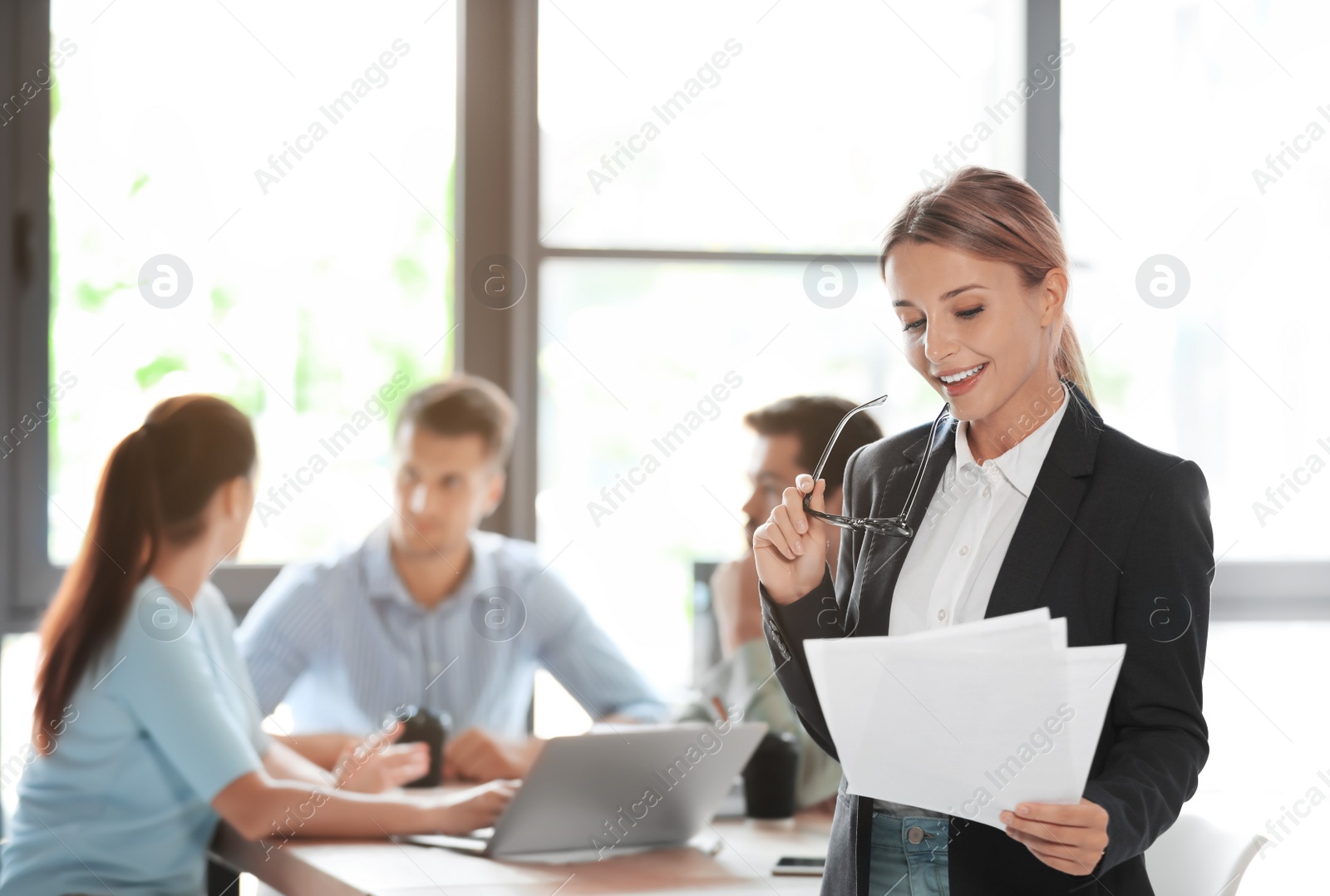 Photo of Office employees having business training at workplace