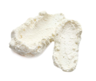 Smears of tasty cream cheese on white background