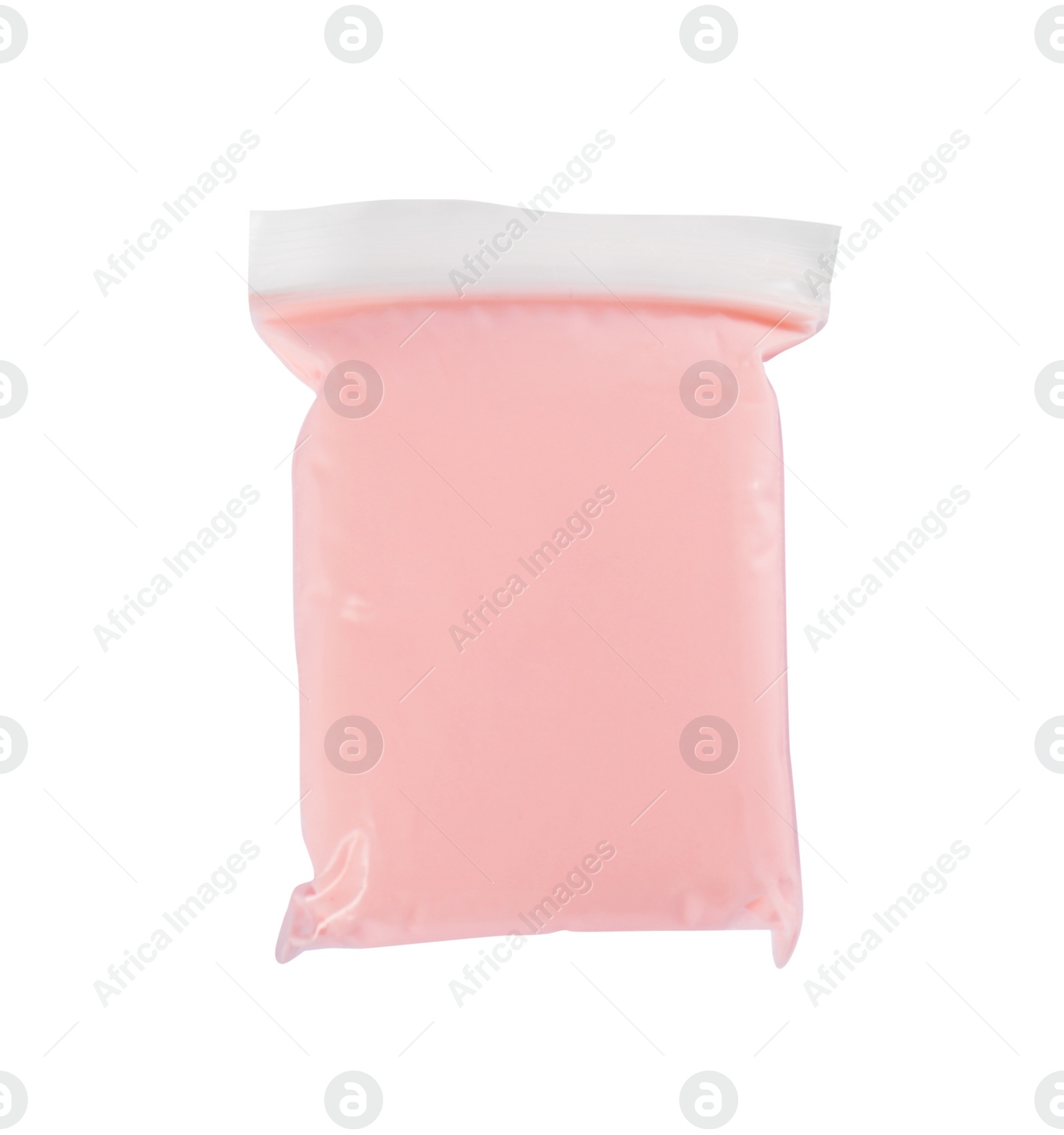 Photo of Package of beige play dough on white background, top view