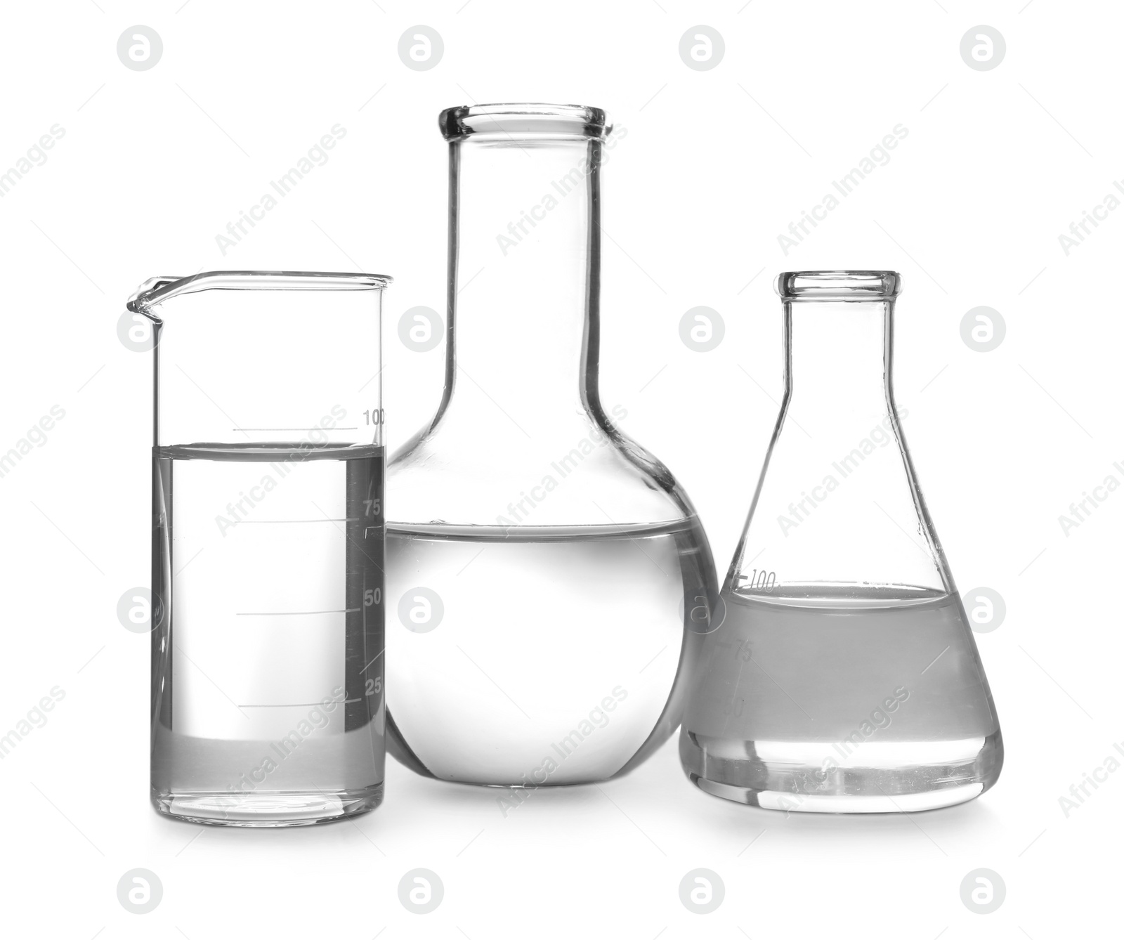 Photo of Glassware with liquids isolated on white. Laboratory analysis