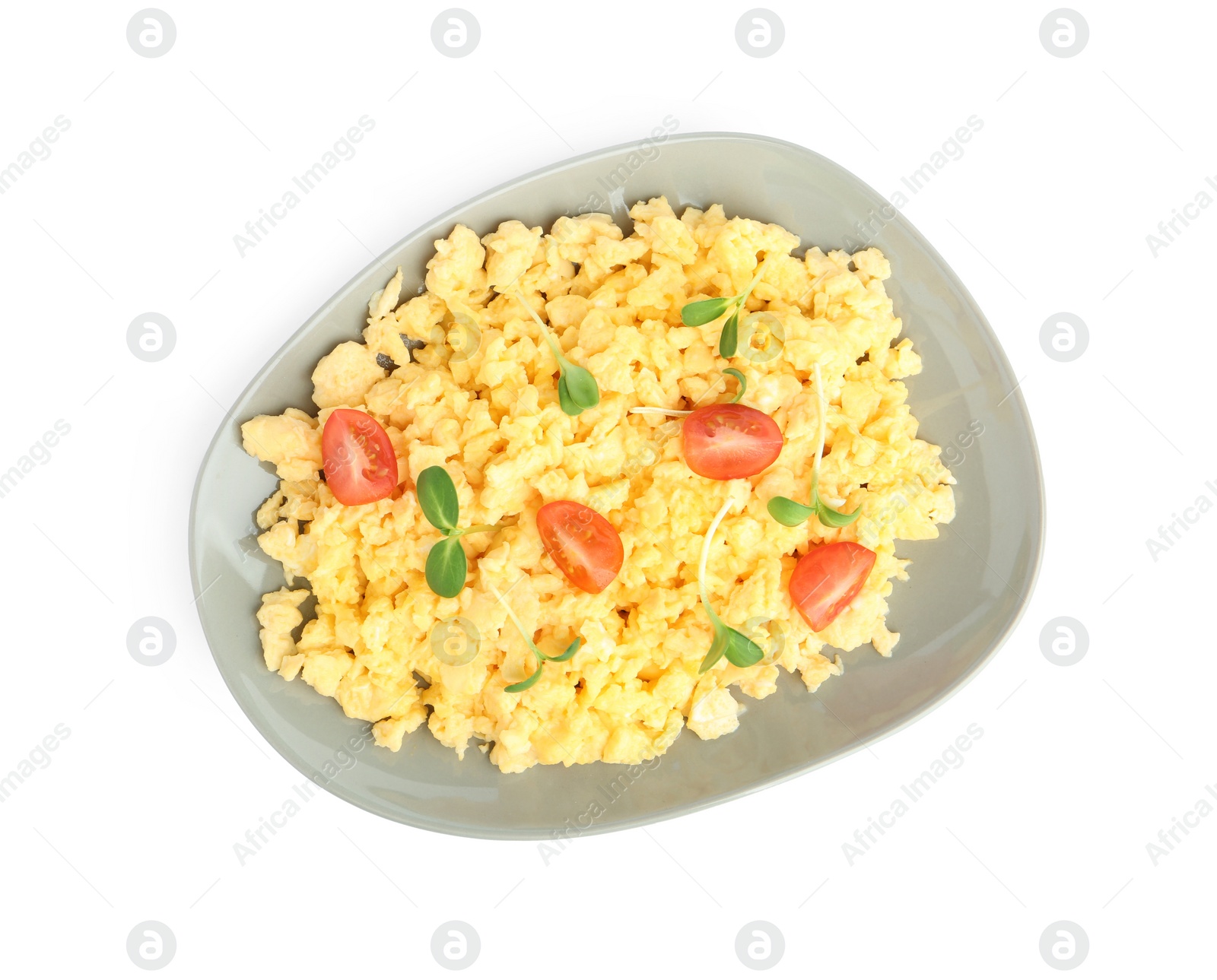Photo of Tasty scrambled eggs with sprouts and cherry tomato isolated on white, top view