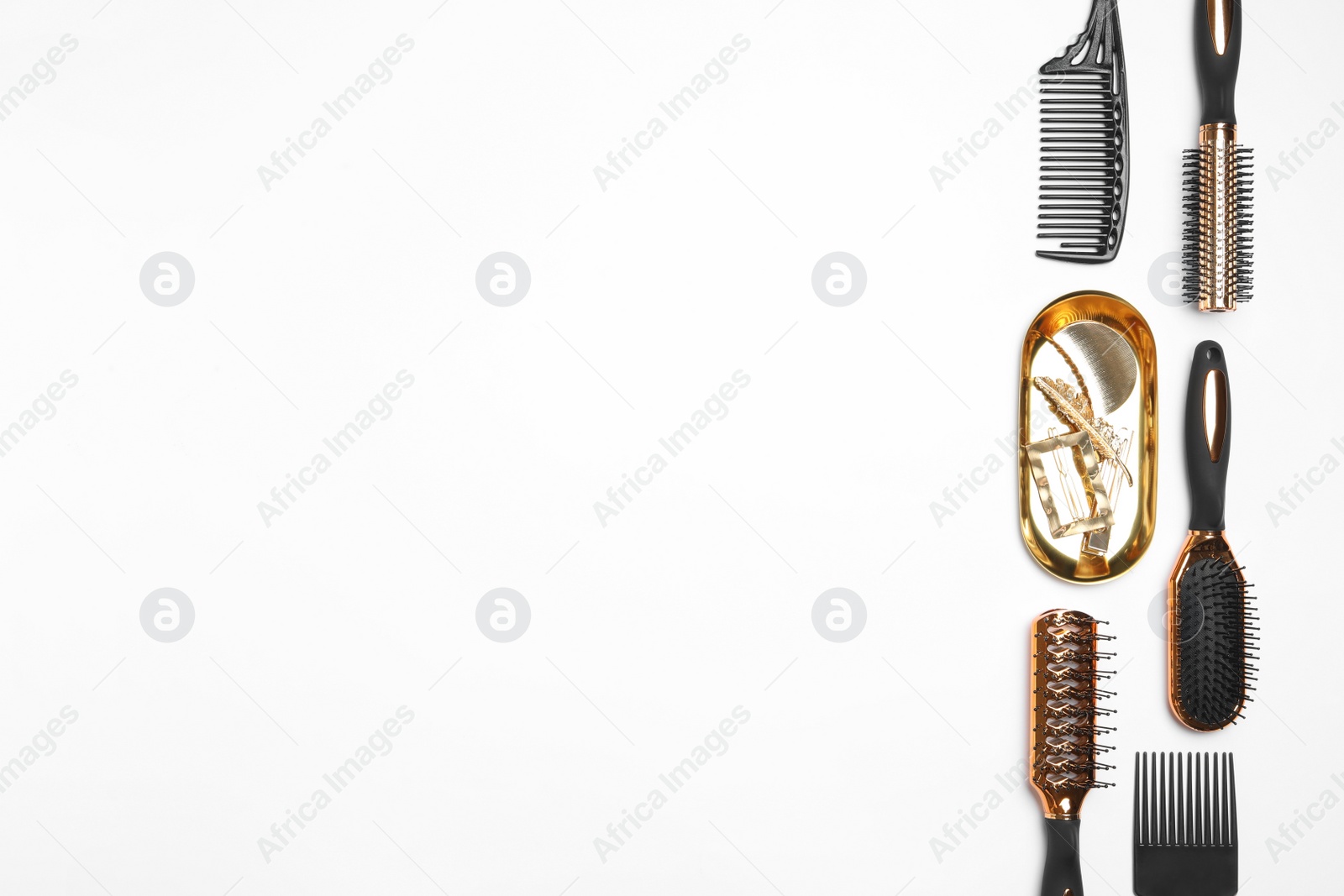 Photo of Composition with hair combs and brushes on white background, top view