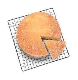 Photo of Baking rack with tasty sponge cake isolated on white, top view