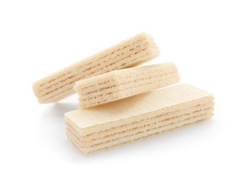 Photo of Delicious crispy wafers on white background. Sweet food