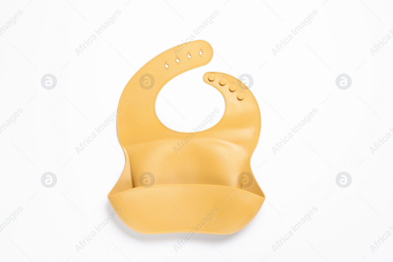 Photo of Orange silicone baby bib isolated on white, top view