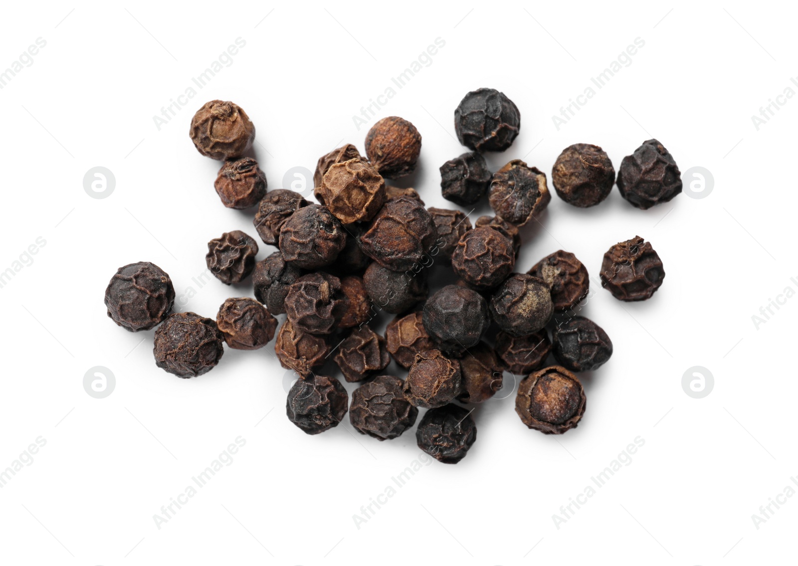 Photo of Aromatic spice. Many black dry peppercorns isolated on white, top view