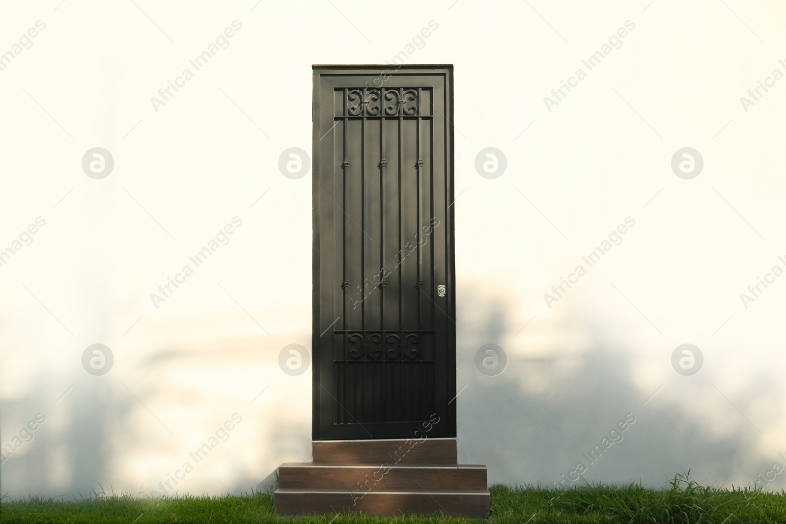 Photo of Entrance of building with beautiful black door