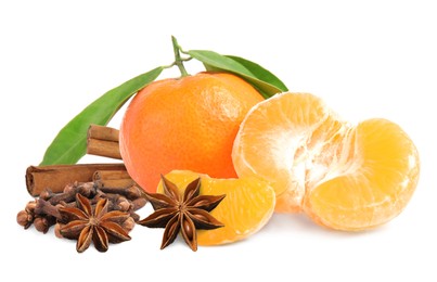 Image of Fresh ripe tangerines cloves, anises and cinnamon on white background