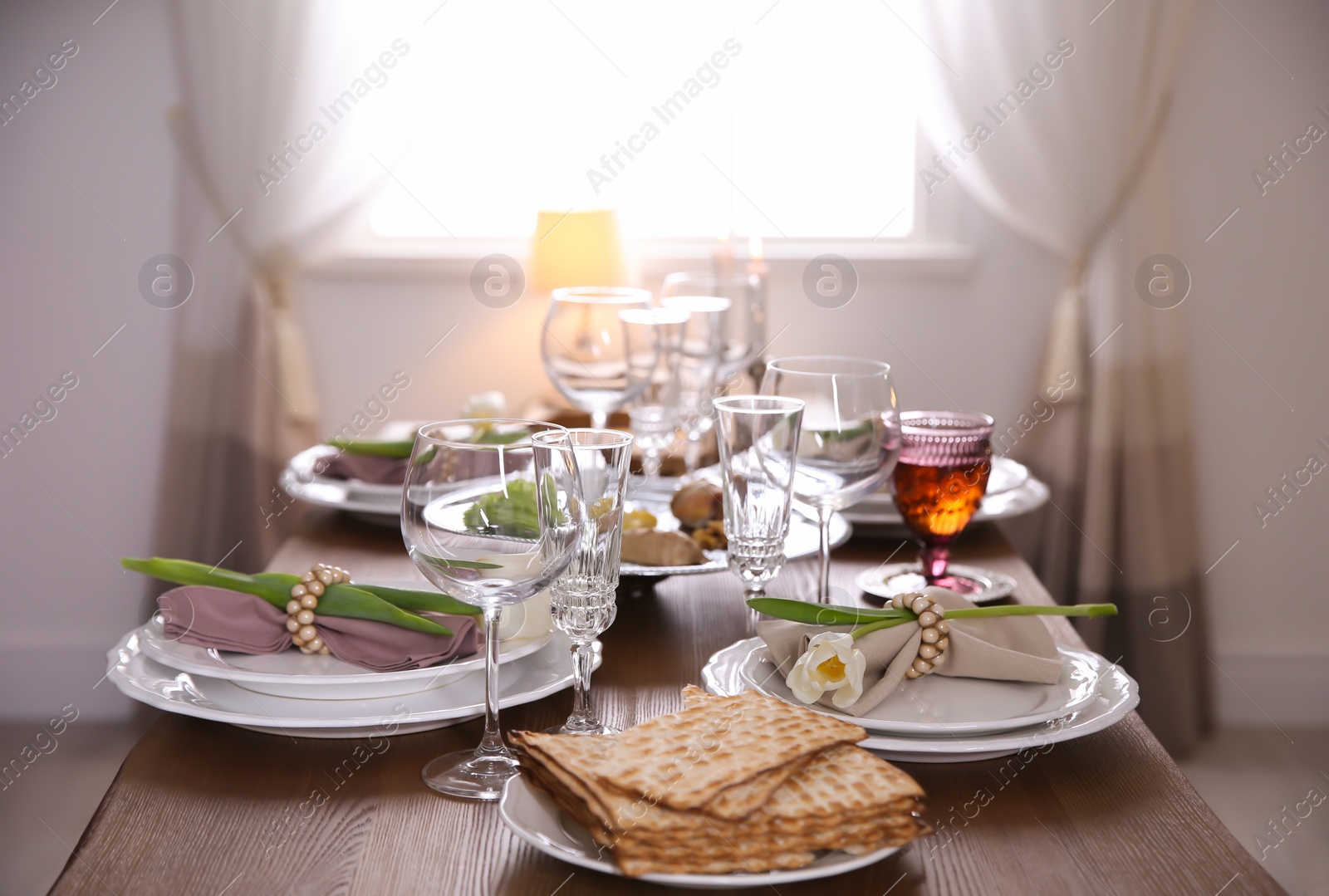 Photo of Festive Passover table setting at home. Pesach celebration