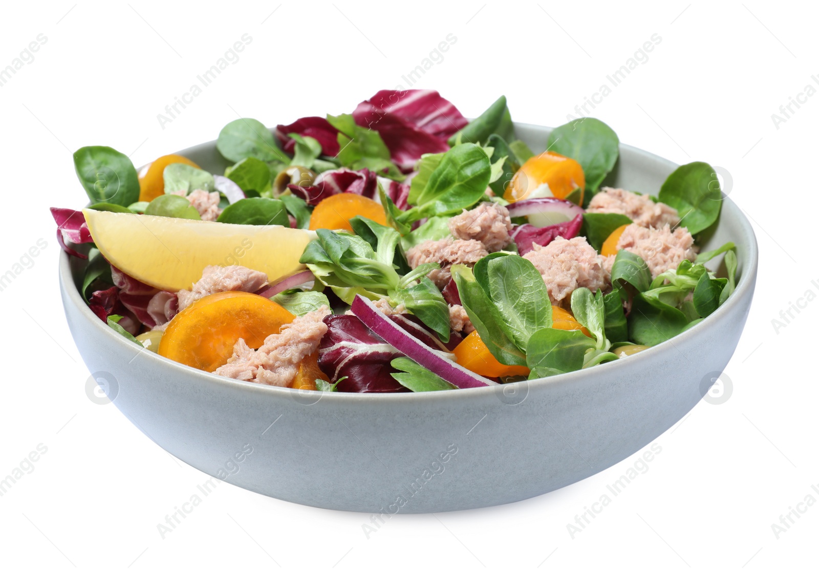 Photo of Bowl of delicious salad with canned tuna and vegetables on white background